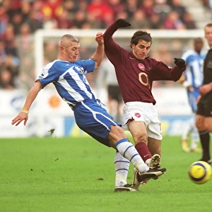 Cesc Fabregas (Arsenal) Graham Kavanagh (Wigan)