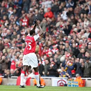 Emmanuel Adebayor (Arsenal) claps the fans as he leaves the pitch