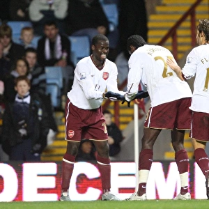 Emmanuel Adebayor celebrates scoring the 2nd Arsenal goal with Emmanuel Eboue