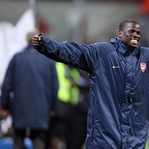 Emmanuel Eboue celebrates at the final whistle (Arsenal)
