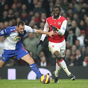 Emmauel Adebayor (Arsenal) Andre Ooijer (Blackburn Rovers)