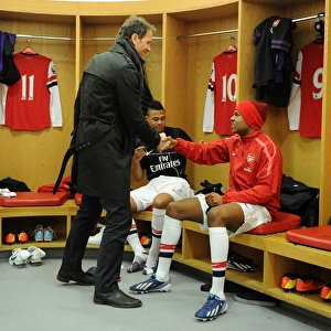 Jens Lehmann (ex Arsenal) shakes hands with Chuba Akpom (Arsenal) before the match