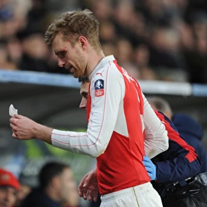 Per Mertesacker's FA Cup Exit: Head Injury Marred Arsenal's Match vs. Hull City (March 2016)