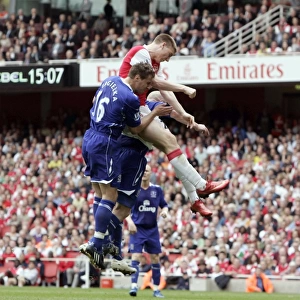 Nicklas Bendtner scores Arsenals goal under pressure from Phil Jagielka (Everton)