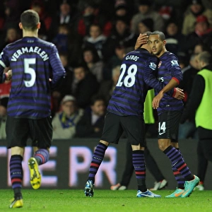 Theo Walcott (Arsenal) is congratulated on the cross that lead to the Arsenal goal