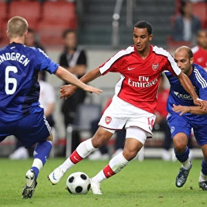 Theo Walcott (Arsenal) Rasmus Lindgrena and Gabri (Ajax)