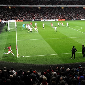 Theo Walcott (Arsenal) takes a corner during the match. Arsenal 0: 2 Swansea. Barclays