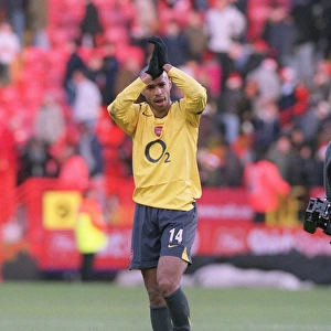 Thierry Henry (Arsenal) claps the fans at the end of the match