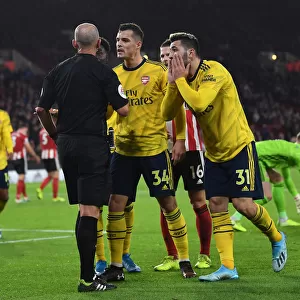 Xhaka and Kolasinac Confront Referee Mike Dean During Sheffield United vs. Arsenal Premier League Clash