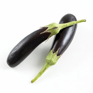 Close-up of two aubergines