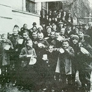 German children receiving soup at communal kitchen