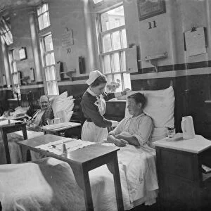 Gravesend Hospital in Kent. Nurse with a young patient. 1939