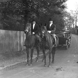 Mr Gook and Miss Henry on horseback. 1933