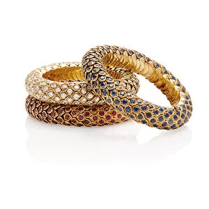 Three Honeycomb bracelets, 1950s (rubies, sapphires, diamonds & gold)