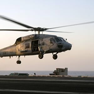 A Sikorsky SH-60F Seahawk lands on the flight deck of USS Dwight D. Eisenhower