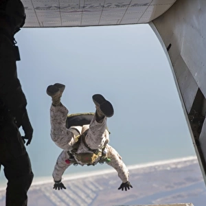 U. S. Marine jumps out the back of an aircraft