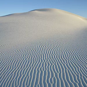 Ripples in white sand running down side of large rounded dune, White Sands National Monument, Chihuahuan Desert, New Mexico, USA