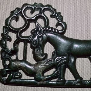 Chinese third century BC bronze plaque, depicting an animal attacking a horse