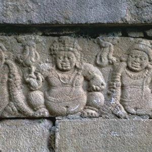 Dwarf figures on a building in the Buddhist city of Anuradhapura