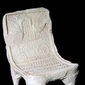Model terracotta chair from Ur with relief design of two birds