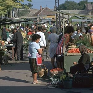 Morning market in a town in Hungary. Artist: CM Dixon