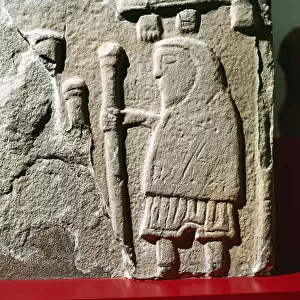 A Pict with hooded cloak & Pictish trousers, St. Vigeans, Scotland, c8th - 9th century