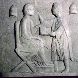 Roman relief of an oculist at work