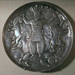 Sassanian dish showing a king holding lions