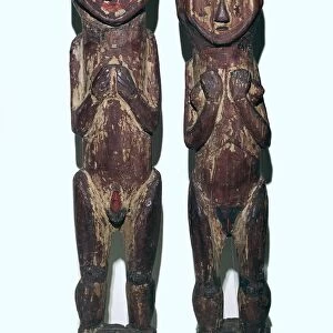 Wooden figures of men and women from north-east Peru