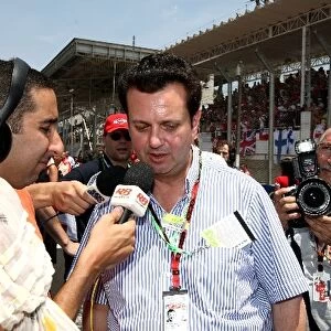 Formula One World Championship: Gilberto Kassab Mayor of Sao Paulo is interviewed on the grid
