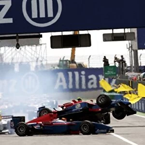 GP2 Series: Start crash between pole sitter Timo Glock iSport International and team mate Andreas Zuber iSport International