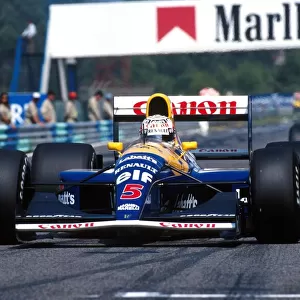Portuguese Grand Prix: Nigel Mansell Williams Renault FW14 was disqualified for having his tyre replaced outside of his pit box when his mid