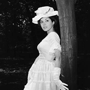 Actress and singer Susan Maughan, aged 20, photographed in a park near her home in