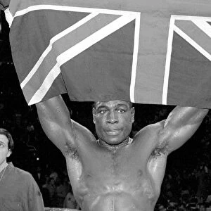 Frank Bruno leaves the ring after his third round defeat defeat by Mike Tyson