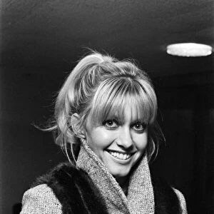 Singer and actress Olivia Newton John at Luton Airport. 28th November 1978