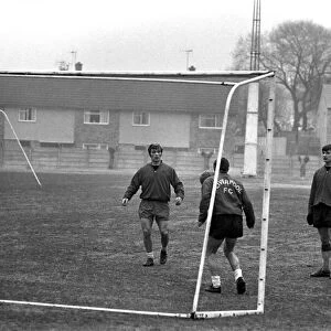 St. John, Wall, Graham and Evans with boss between the sticks druring training at their