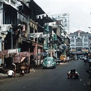 A typical street scene in Chinatown city in Singapore circa 1975