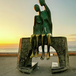Mexico, Puerto Vallarta, La Nostalgia, a bronze sculpture on the Malecon, work of Jose Ramiz Barquet